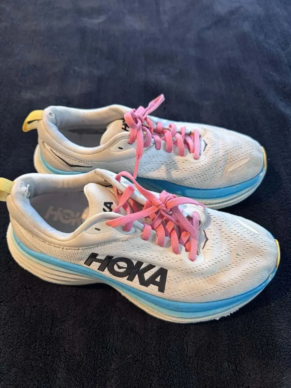 Hoka Women's White Athletic Shoes with Blue Trim and Pink Laces